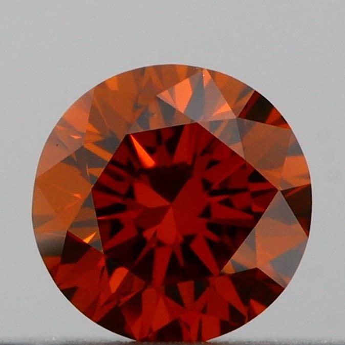Loose Diamond - ROUND 0.2ct Fancy Vivid Orange SI1: Loose Diamond - ROUND 0.2ct Fancy Vivid Orange SI1 Source: This is a real non-mined Diamond that has been grown in a lab Shape: ROUND Carats: 0.2 Color: Fancy Vivid Orange Certification: IGI Video: