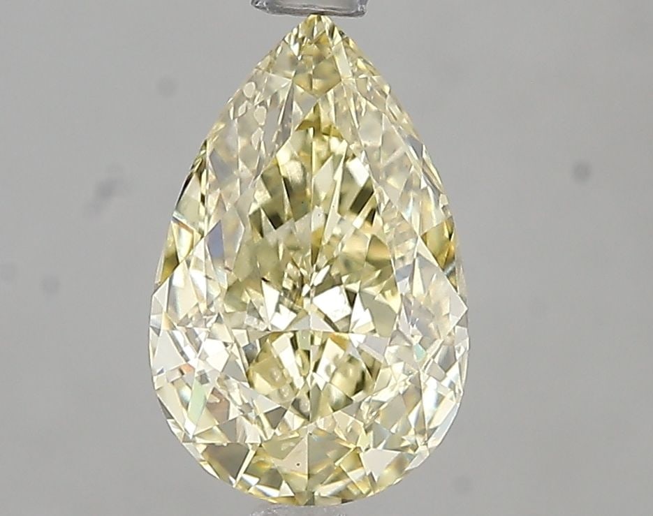 Loose Diamond - PEAR 2.01ct Fancy Yellow VS2: Loose Diamond - PEAR 2.01ct Fancy Yellow VS2 Source: This is a real non-mined Diamond that has been grown in a lab Shape: PEAR Carats: 2.01 Color: Fancy Yellow Certification: IGI Video: