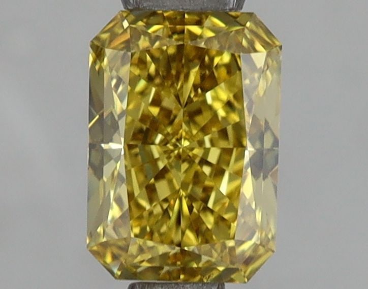 Loose Diamond - RADIANT 1.0ct Fancy Vivid Yellow VS2: Loose Diamond - RADIANT 1.0ct Fancy Vivid Yellow VS2 Source: This is a real non-mined Diamond that has been grown in a lab Shape: RADIANT Carats: 1.0 Color: Fancy Vivid Yellow Certification: IGI Video