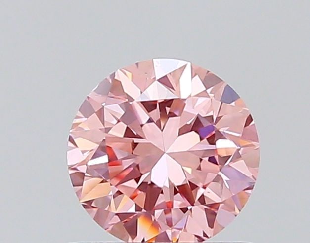Loose Diamond - ROUND 0.7ct Fancy Vivid Pink VS1: Loose Diamond - ROUND 0.7ct Fancy Vivid Pink VS1 Source: This is a real non-mined Diamond that has been grown in a lab Shape: ROUND Carats: 0.7 Color: Fancy Vivid Pink Certification: NONE The Diamond 
