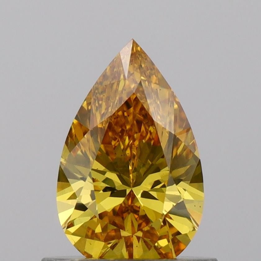 Loose Diamond - PEAR 0.7ct Fancy Vivid Yellow VS2: Loose Diamond - PEAR 0.7ct Fancy Vivid Yellow VS2 Source: This is a real non-mined Diamond that has been grown in a lab Shape: PEAR Carats: 0.7 Color: Fancy Vivid Yellow Certification: IGI Video: