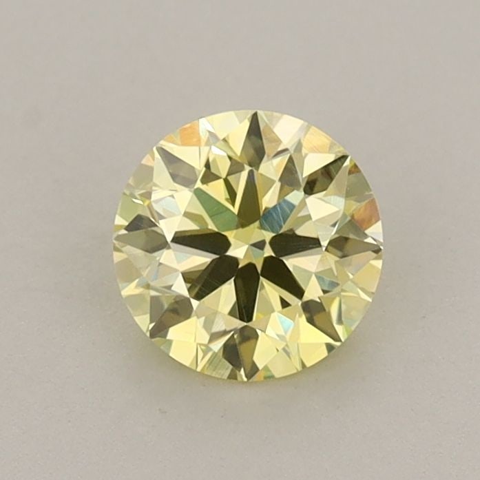 Loose Diamond - ROUND 0.62ct Fancy Yellow VVS2: Loose Diamond - ROUND 0.62ct Fancy Yellow VVS2 Source: This is a real non-mined Diamond that has been grown in a lab Shape: ROUND Carats: 0.62 Color: Fancy Yellow Certification: IGI Video: