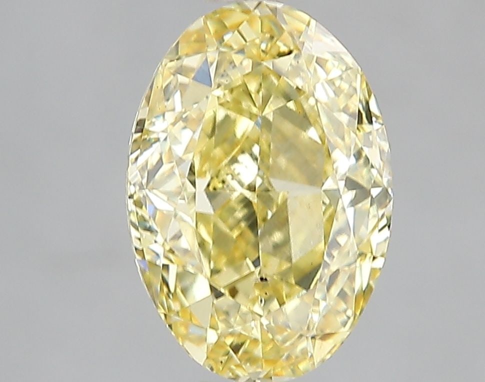 Loose Diamond - OVAL 3.01ct Fancy Vivid Yellow SI1: Loose Diamond - OVAL 3.01ct Fancy Vivid Yellow SI1 Source: This is a real non-mined Diamond that has been grown in a lab Shape: OVAL Carats: 3.01 Color: Fancy Vivid Yellow Certification: IGI Video:
