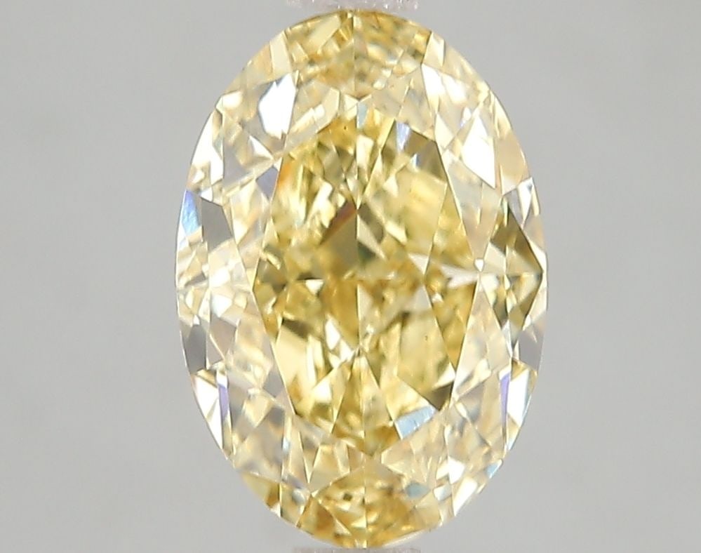 Loose Diamond - OVAL 3.1ct Fancy Vivid Yellow VS2: Loose Diamond - OVAL 3.1ct Fancy Vivid Yellow VS2 Source: This is a real non-mined Diamond that has been grown in a lab Shape: OVAL Carats: 3.1 Color: Fancy Vivid Yellow Certification: IGI Video:
