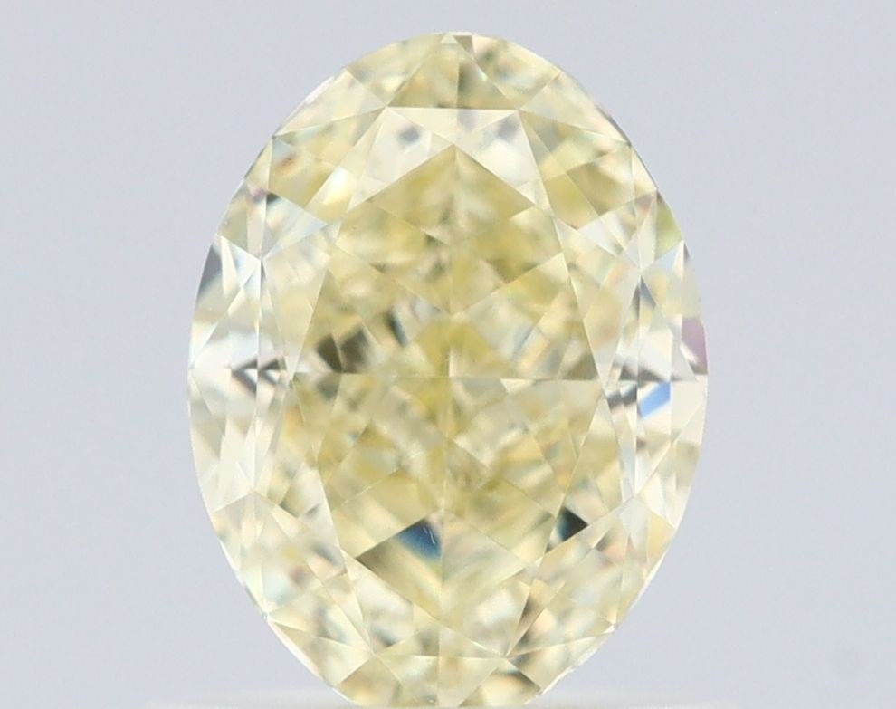 Loose Diamond - OVAL 1.01ct Fancy Light Yellow VS1: Loose Diamond - OVAL 1.01ct Fancy Light Yellow VS1 Source: Natural Shape: OVAL Carats: 1.01 Color: Fancy Light Yellow Certification: GIA Video:
