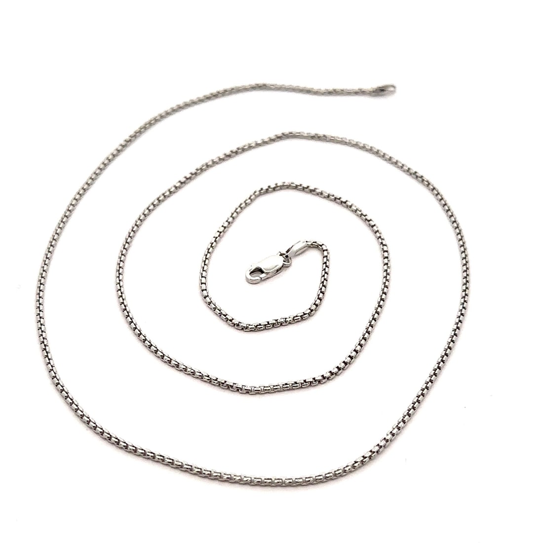22 Inch Beveled Box Chain Necklace Solid 14k White Gold 1.2mm Unisex: 22 Inch Beveled Box Chain Necklace Solid 14k White Gold 1.2mm Unisex This un-used 14k white gold chain necklace features a beveled box link design and a secure lobster clasp. It is solid in constructi
