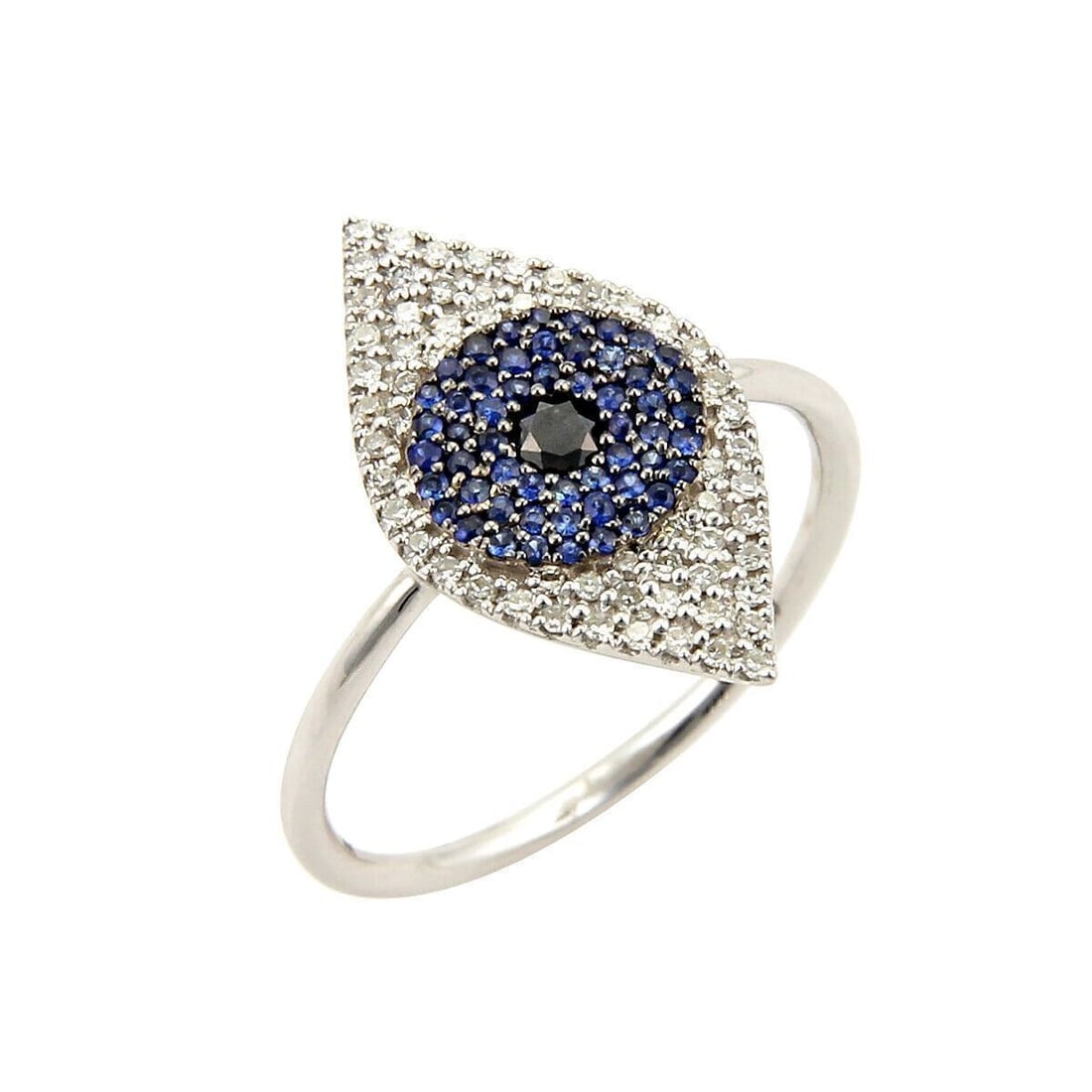 Vintage Evil Eye 14k White Gold Ring with Diamonds and Sapphires Size 6.5: Vintage Evil Eye 14k White Gold Ring with Diamonds and Sapphires Size 6.5 This vintage band ring features a symbolic evil eye motif crafted in 14k white gold. The design is accented with approximately