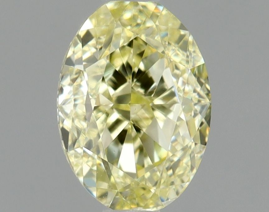 Loose Diamond - OVAL 0.46ct Fancy Light Yellow VS1: Loose Diamond - OVAL 0.46ct Fancy Light Yellow VS1 Source: Natural Shape: OVAL Carats: 0.46 Color: Fancy Light Yellow Certification: GIA Video: