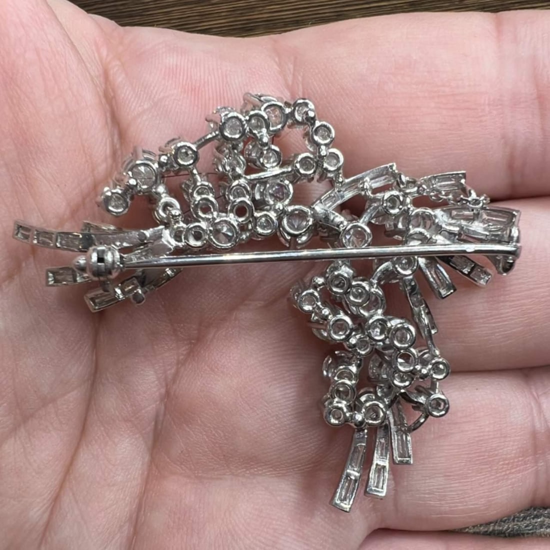 Vintage 1950's Platinum Diamond Brooch 35 Round 33 Baguette 9.25 Ct: Vintage 1950's Platinum Diamond Brooch 35 Round 33 Baguette 9.25 Ct This exquisite 1950's Platinum Diamond Brooch showcases a stunning array of diamonds. Weighing 19.6 grams, it is adorned with 35 rou