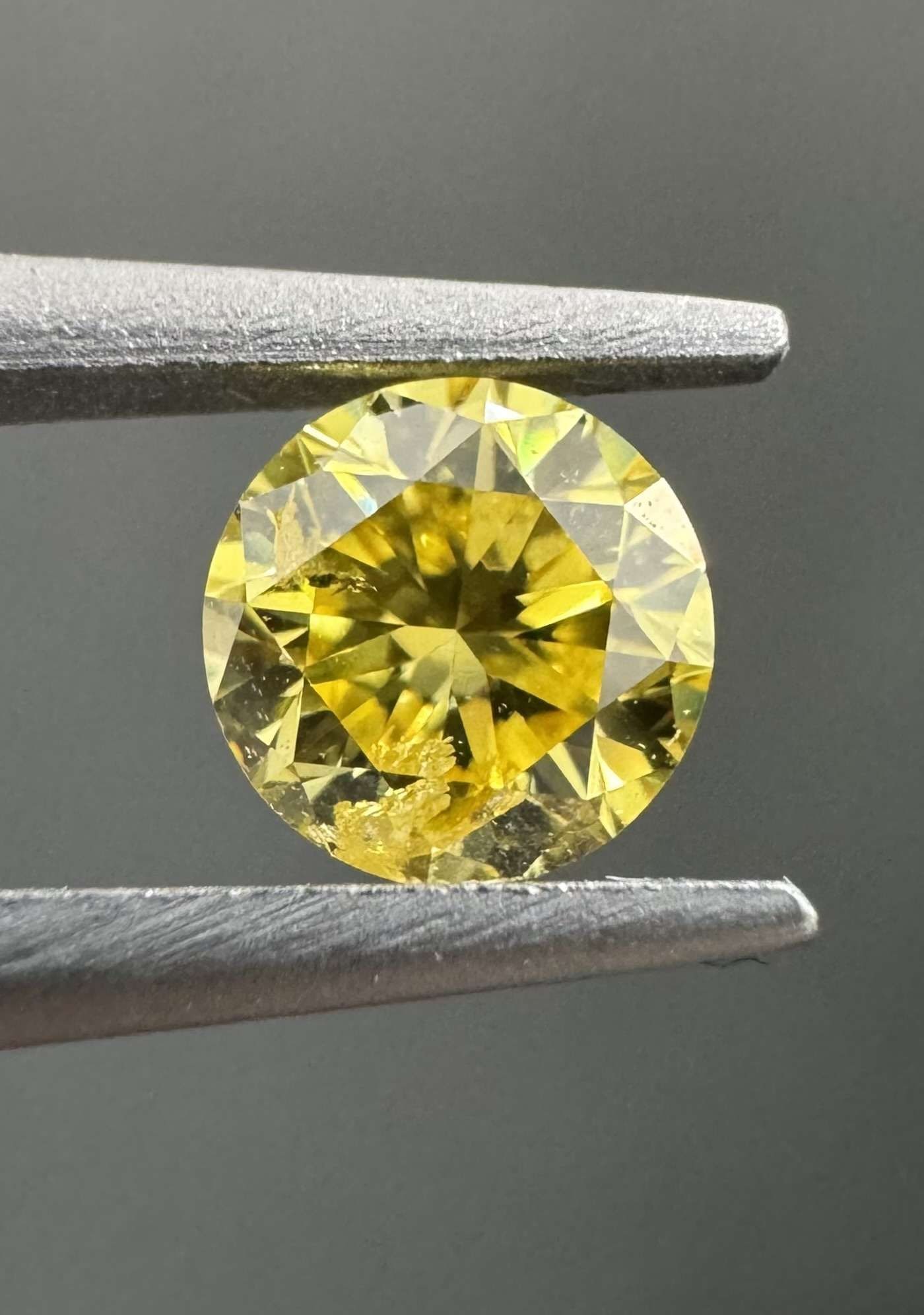 Loose Diamond - ROUND 0.32ct Fancy Vivid Yellow I2: Loose Diamond - ROUND 0.32ct Fancy Vivid Yellow I2 Source: Natural Shape: ROUND Carats: 0.32 Color: Fancy Vivid Yellow Certification: GIA Video: