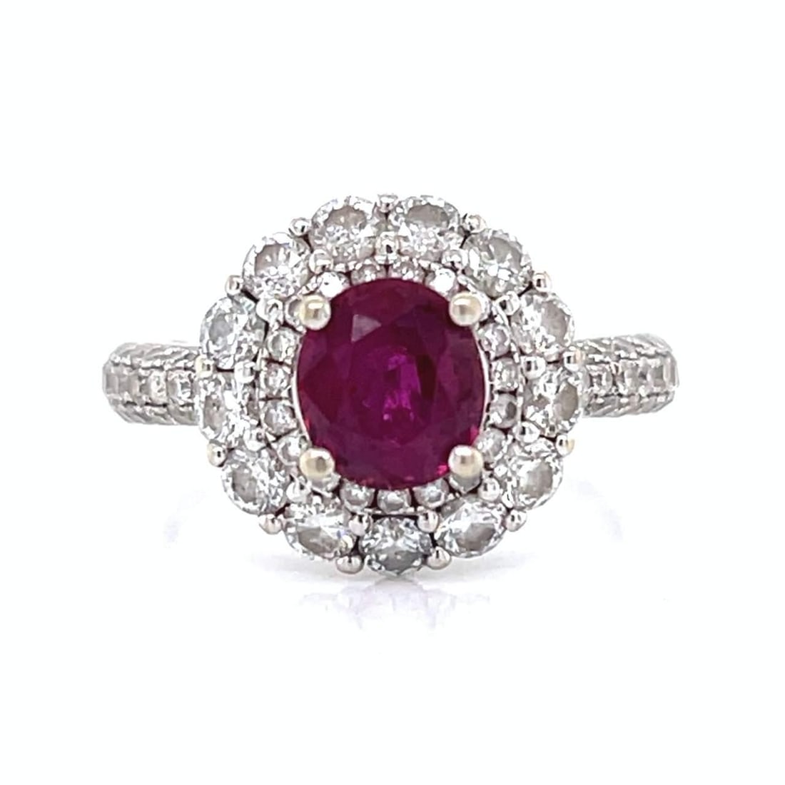 14K White Gold Ruby 1.00 Ct Diamond Ring 1.50 Ct F-G VVS-VS1: 14K White Gold Ruby 1.00 Ct Diamond Ring 1.50 Ct F-G VVS-VS1 This stunning 14K White Gold Ruby & Diamond Ring features a vibrant approximately 1.00 Ct. ruby, beautifully complemented by approximately 
