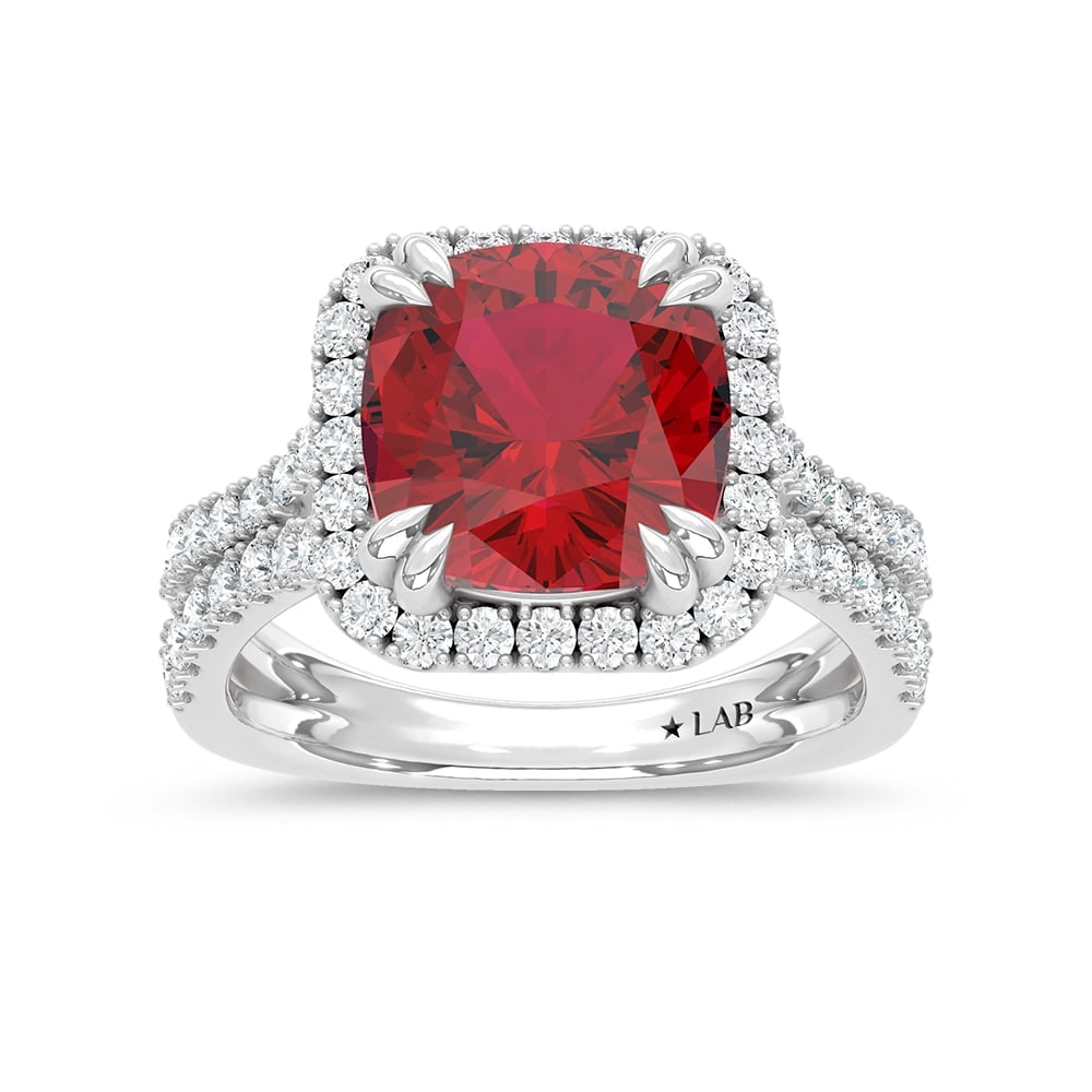 14K White Gold Lab Grown Diamond 6 5/8 Ct.Tw. Cushion Shape Recrystalized Ruby Engagement Ring: 14K White Gold Lab Grown Diamond 6 5/8 Ct.Tw. Cushion Shape Recrystalized Ruby Engagement Ring (Center 5 3/4 ct) Exude timeless elegance with this 14K white gold engagement ring. Its centerpiece is a 