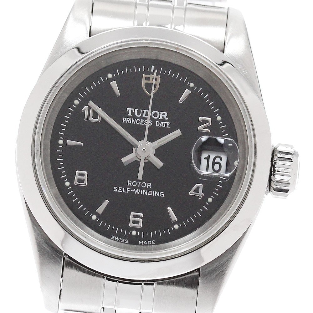 TUDOR Princess Date 92400N stainless steel automatic ladies watch: TUDOR Princess Date 92400N stainless steel automatic ladies watch This Tudor Princess Date Automatic women's wristwatch features a stainless steel case and band with a black dial. The watch is powered