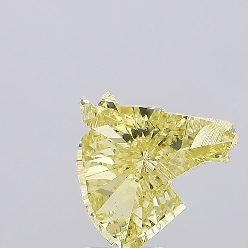 Loose Diamond - OTHER 2.54ct Fancy Vivid Yellow VS2: Loose Diamond - OTHER 2.54ct Fancy Vivid Yellow VS2 Source: This is a real non-mined Diamond that has been grown in a lab Shape: OTHER Carats: 2.54 Color: Fancy Vivid Yellow Certification: NONE Video:
