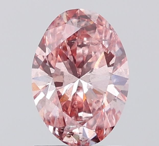 Loose Diamond - OVAL 1.3ct Fancy Vivid Pink SI2: Loose Diamond - OVAL 1.3ct Fancy Vivid Pink SI2 Source: This is a real non-mined Diamond that has been grown in a lab Shape: OVAL Carats: 1.3 Color: Fancy Vivid Pink Certification: IGI Video: