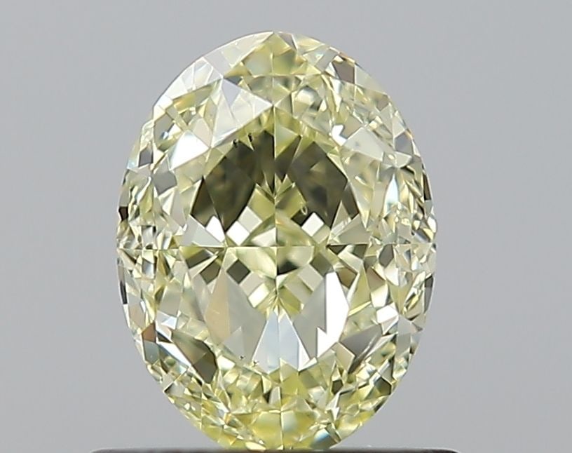 Loose Diamond - OVAL 1.02ct Fancy Light Yellow SI1: Loose Diamond - OVAL 1.02ct Fancy Light Yellow SI1 Source: Natural Shape: OVAL Carats: 1.02 Color: Fancy Light Yellow Certification: GIA Video: