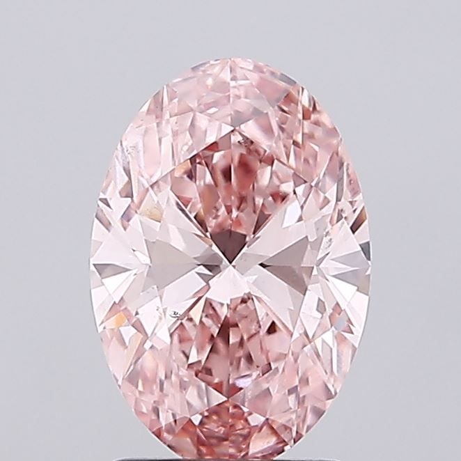 Loose Diamond - OVAL 1.85ct Fancy Vivid Pink VS2: Loose Diamond - OVAL 1.85ct Fancy Vivid Pink VS2 Source: This is a real non-mined Diamond that has been grown in a lab Shape: OVAL Carats: 1.85 Color: Fancy Vivid Pink Certification: IGI Video: