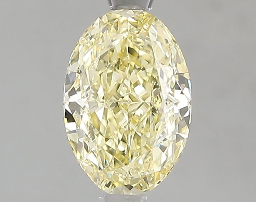 Loose Diamond - OVAL 1.61ct Fancy Yellow VS1: Loose Diamond - OVAL 1.61ct Fancy Yellow VS1 Source: This is a real non-mined Diamond that has been grown in a lab Shape: OVAL Carats: 1.61 Color: Fancy Yellow Certification: IGI Video: