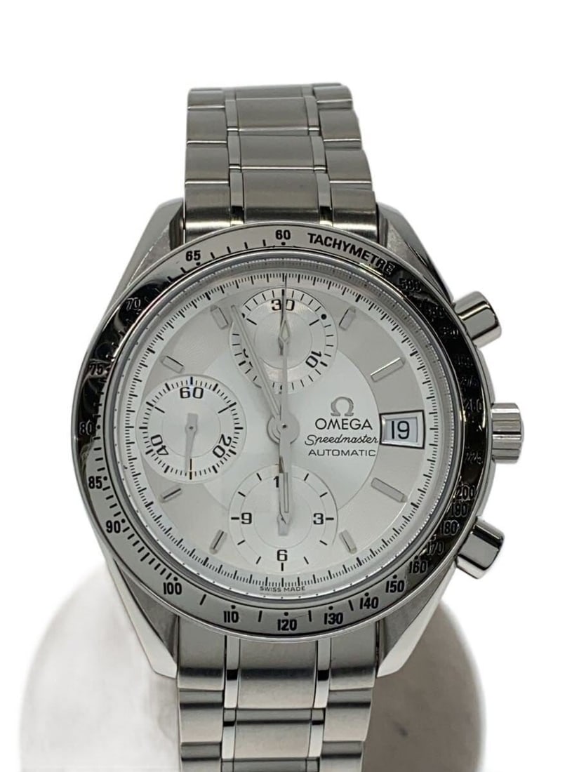 Omega Speedmaster Swiss Men's Wristwatch: Omega Speedmaster Swiss Men's Wristwatch This OMEGA Speedmaster men's wristwatch is a Swiss-made timepiece designed for reliability and style. It is pre-owned and classified as Grade B, indicating sli