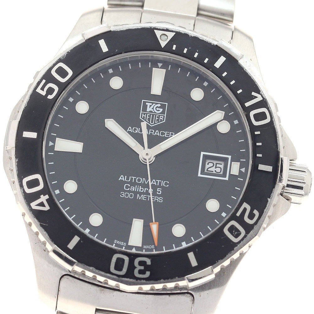 TAG Heuer Aquaracer Caliber 5 stainless steel men's date watch: TAG Heuer Aquaracer Caliber 5 stainless steel men's date watch This TAG Heuer Aquaracer Caliber 5 Date men's wristwatch features a stainless steel case and band with a black dial. The watch is powered