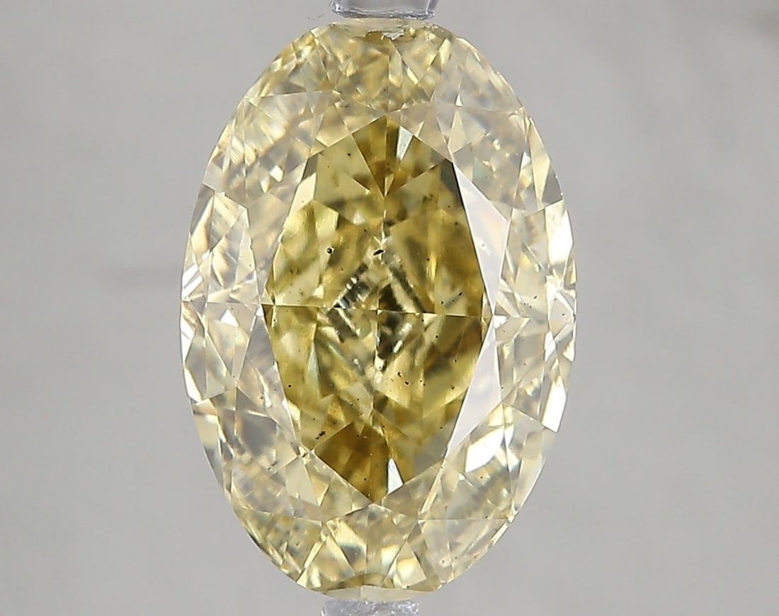 Loose Diamond - OVAL 5.02ct Fancy Intense Gray Yellow SI1: Loose Diamond - OVAL 5.02ct Fancy Intense Gray Yellow SI1 Source: This is a real non-mined Diamond that has been grown in a lab Shape: OVAL Carats: 5.02 Color: Fancy Intense Gray Yellow
