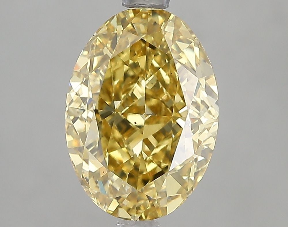 Loose Diamond - OVAL 3.01ct Fancy Intense Yellow VS2: Loose Diamond - OVAL 3.01ct Fancy Intense Yellow VS2 Source: This is a real non-mined Diamond that has been grown in a lab Shape: OVAL Carats: 3.01 Color: Fancy Intense Yellow Certification: IGI Video