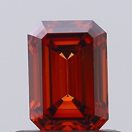 Loose Diamond - EMERALD 0.53ct Fancy Vivid Orange VVS2: Loose Diamond - EMERALD 0.53ct Fancy Vivid Orange VVS2 Source: This is a real non-mined Diamond that has been grown in a lab Shape: EMERALD Carats: 0.53 Color: Fancy Vivid Orange Certification: IGI Vi