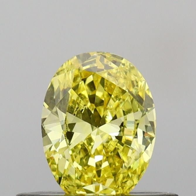 Loose Diamond - OVAL 0.4ct Fancy Vivid Yellow VS1: Loose Diamond - OVAL 0.4ct Fancy Vivid Yellow VS1 Source: This is a real non-mined Diamond that has been grown in a lab Shape: OVAL Carats: 0.4 Color: Fancy Vivid Yellow Certification: IGI Video: