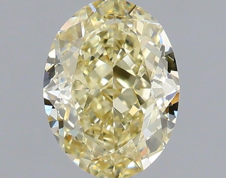 Loose Diamond - OVAL 1.0ct Fancy Yellow VVS2: Loose Diamond - OVAL 1.0ct Fancy Yellow VVS2 Source: This is a real non-mined Diamond that has been grown in a lab Shape: OVAL Carats: 1.0 Color: Fancy Yellow Certification: IGI Video: