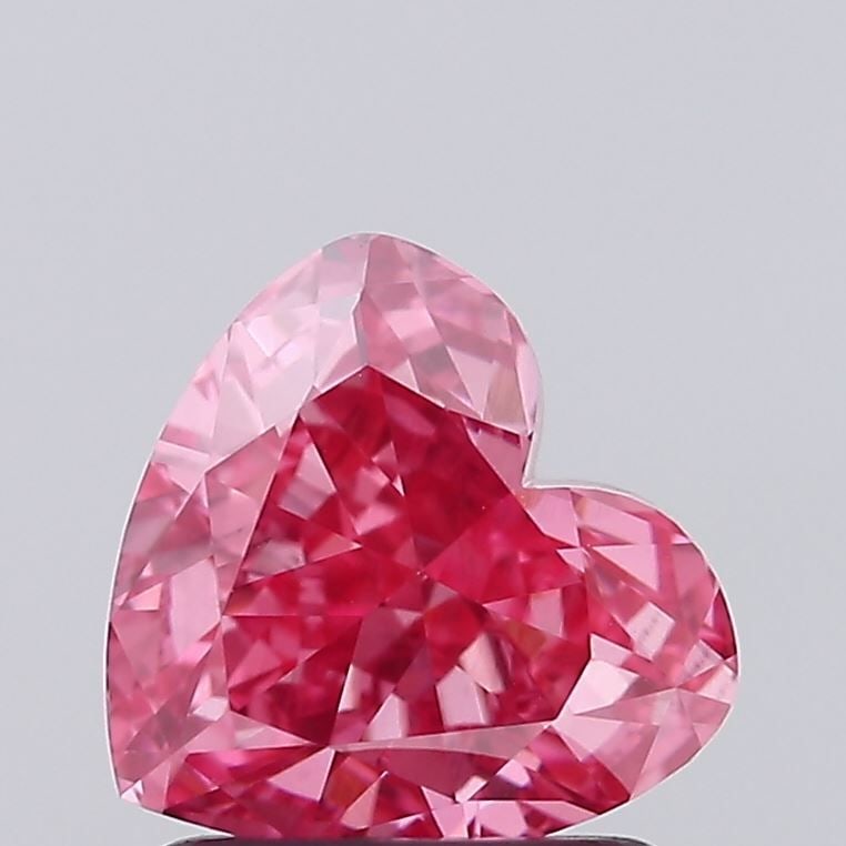 Loose Diamond - HEART 1.4ct Fancy Vivid Pink VS2: Loose Diamond - HEART 1.4ct Fancy Vivid Pink VS2 Source: This is a real non-mined Diamond that has been grown in a lab Shape: HEART Carats: 1.4 Color: Fancy Vivid Pink Certification: IGI Video: