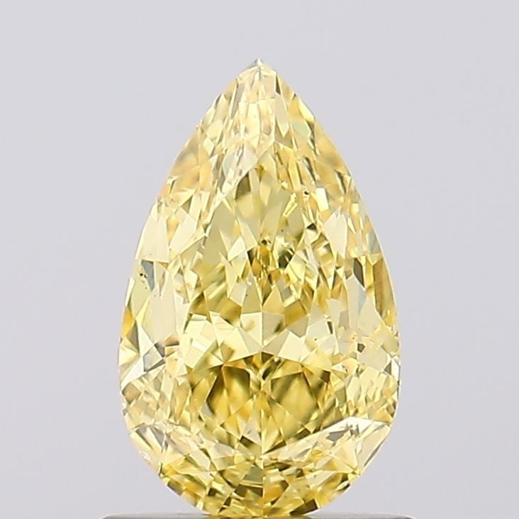 Loose Diamond - PEAR 1.01ct Fancy Vivid Yellow SI1: Loose Diamond - PEAR 1.01ct Fancy Vivid Yellow SI1 Source: This is a real non-mined Diamond that has been grown in a lab Shape: PEAR Carats: 1.01 Color: Fancy Vivid Yellow Certification: IGI Video:
