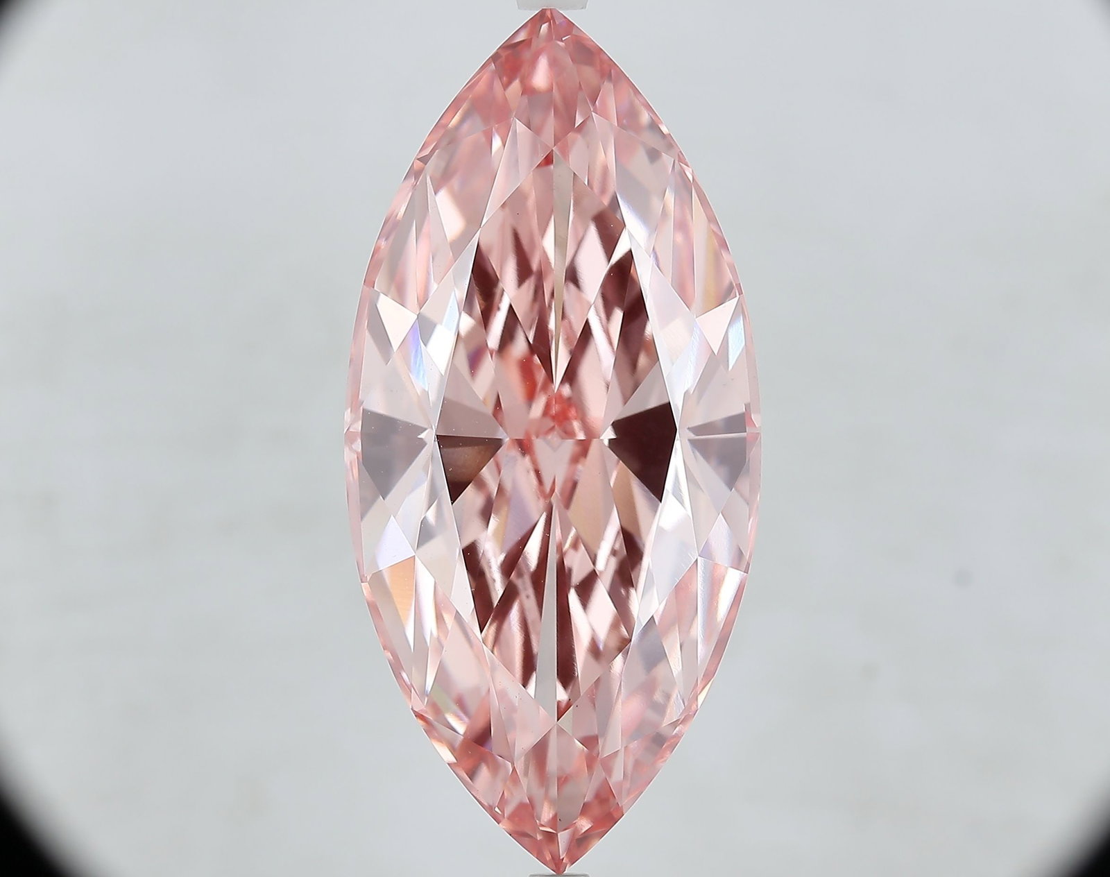 Loose Diamond - MARQUISE 20.28ct Fancy Vivid Pink VS1: Loose Diamond - MARQUISE 20.28ct Fancy Vivid Pink VS1 Source: This is a real non-mined Diamond that has been grown in a lab Shape: MARQUISE Carats: 20.28 Color: Fancy Vivid Pink Certification: IGI Vid