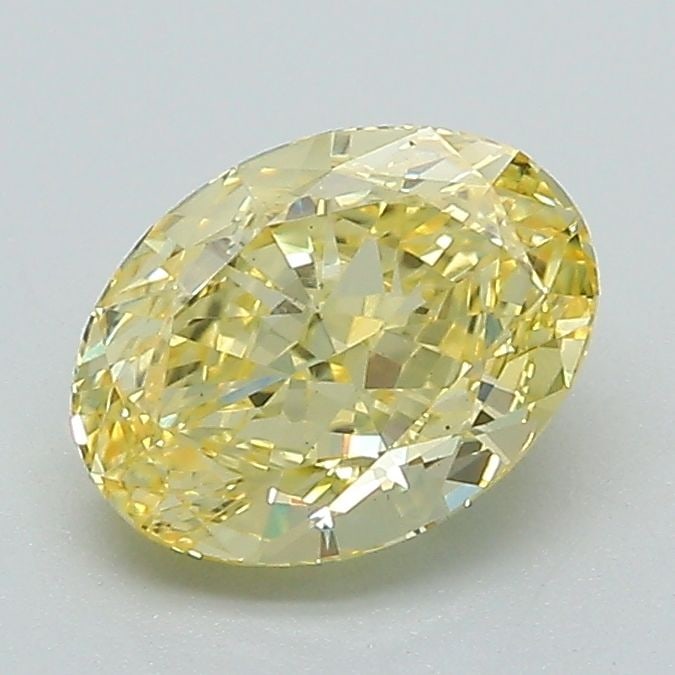 Loose Diamond - OVAL 1.31ct Fancy Vivid Yellow VS1: Loose Diamond - OVAL 1.31ct Fancy Vivid Yellow VS1 Source: This is a real non-mined Diamond that has been grown in a lab Shape: OVAL Carats: 1.31 Color: Fancy Vivid Yellow Certification: IGI Video: