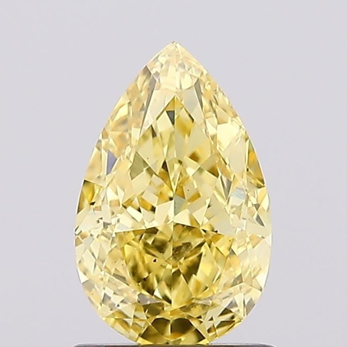 Loose Diamond - PEAR 1.13ct Fancy Vivid Yellow VS2: Loose Diamond - PEAR 1.13ct Fancy Vivid Yellow VS2 Source: This is a real non-mined Diamond that has been grown in a lab Shape: PEAR Carats: 1.13 Color: Fancy Vivid Yellow Certification: IGI Video: