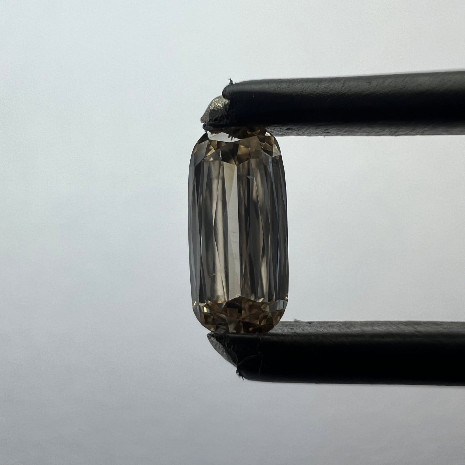 Loose Diamond - CUSHION BRILLIANT 0.3ct Brown VS2: Loose Diamond - CUSHION BRILLIANT 0.3ct Brown VS2 Source: This is a real non-mined Diamond that has been grown in a lab Shape: CUSHION BRILLIANT Carats: 0.3 Color: Brown Certification: NONE The Diamon