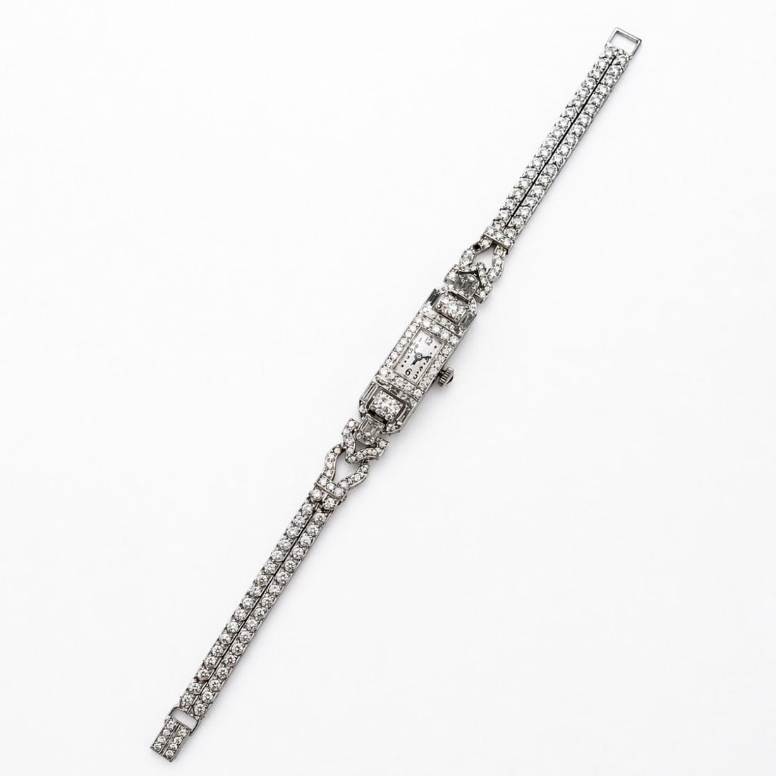 Mathey Tissot platinum Art Deco diamond manual wind watch: Mathey Tissot platinum Art Deco diamond manual wind watch This Mathey Tissot Art Deco watch features a platinum case adorned with 166 round diamonds totaling approximately 4.60 carats and 12 baguette 
