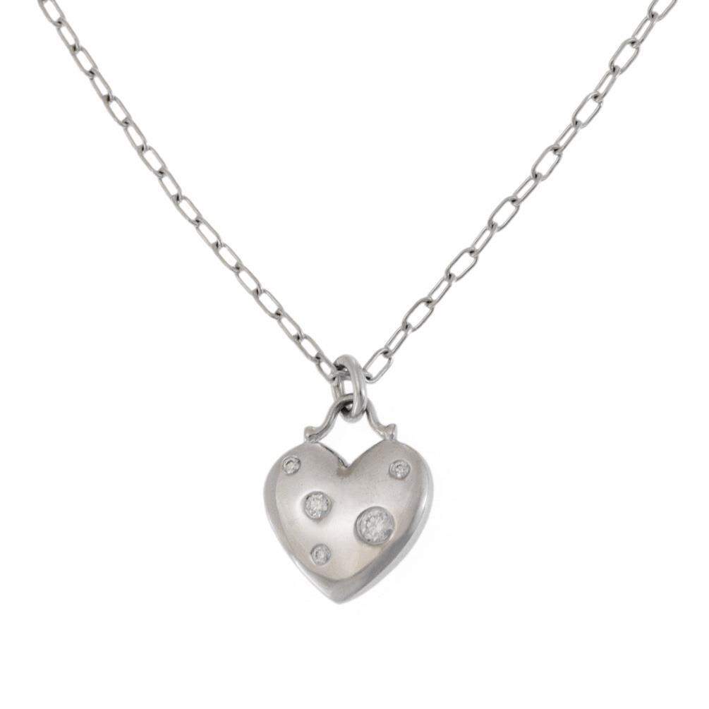 Tiffany & Co. Etoile Heart Pendant Necklace 18k White Gold Diamonds: Tiffany & Co. Etoile Heart Pendant Necklace 18k White Gold Diamonds This elegant Tiffany & Co. Etoile Heart Pendant Necklace showcases a finely crafted heart pendant made from 18k white gold with a hi