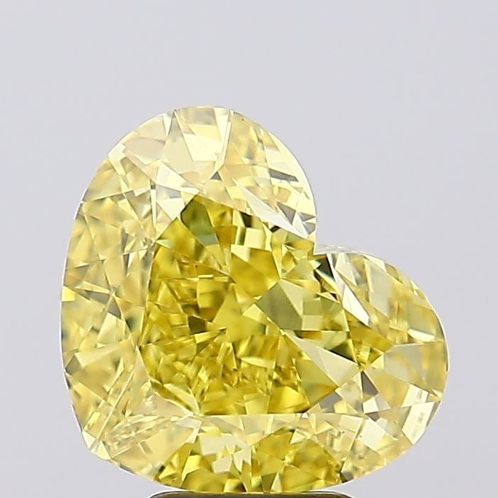 Loose Diamond - HEART 6.09ct Fancy Vivid Yellow VS1: Loose Diamond - HEART 6.09ct Fancy Vivid Yellow VS1 Source: This is a real non-mined Diamond that has been grown in a lab Shape: HEART Carats: 6.09 Color: Fancy Vivid Yellow Certification: IGI Video: