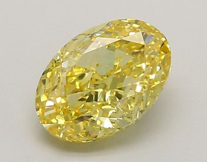 Loose Diamond - OVAL 1.16ct Fancy Vivid Yellow VS1: Loose Diamond - OVAL 1.16ct Fancy Vivid Yellow VS1 Source: This is a real non-mined Diamond that has been grown in a lab Shape: OVAL Carats: 1.16 Color: Fancy Vivid Yellow Certification: IGI Video: