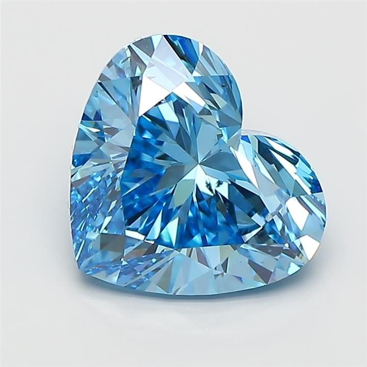 Loose Diamond - HEART 3.01ct Fancy Vivid Blue VS2: Loose Diamond - HEART 3.01ct Fancy Vivid Blue VS2 Source: This is a real non-mined Diamond that has been grown in a lab Shape: HEART Carats: 3.01 Color: Fancy Vivid Blue Certification: IGI Video: