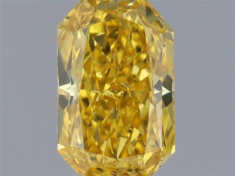 Loose Diamond - RADIANT 0.59ct Fancy Vivid Yellow VS2: Loose Diamond - RADIANT 0.59ct Fancy Vivid Yellow VS2 Source: This is a real non-mined Diamond that has been grown in a lab Shape: RADIANT Carats: 0.59 Color: Fancy Vivid Yellow Certification: IGI Vid