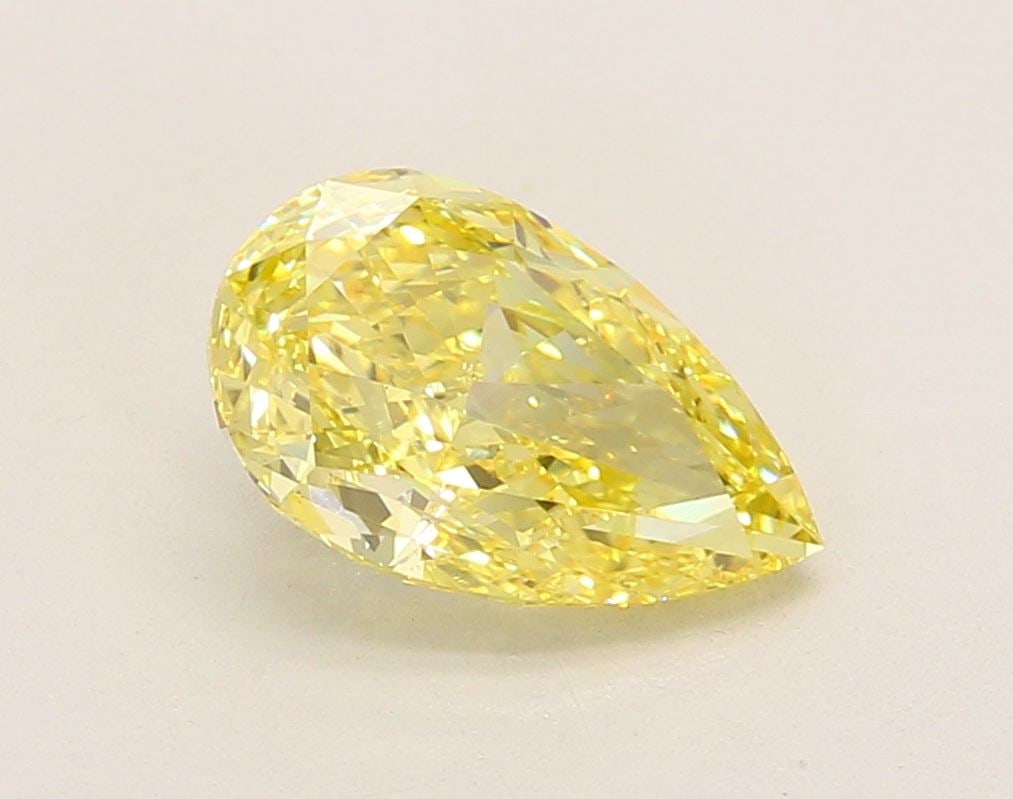 Loose Diamond - PEAR 2.0ct Fancy Vivid Yellow VS1: Loose Diamond - PEAR 2.0ct Fancy Vivid Yellow VS1 Source: This is a real non-mined Diamond that has been grown in a lab Shape: PEAR Carats: 2.0 Color: Fancy Vivid Yellow Certification: IGI Video: