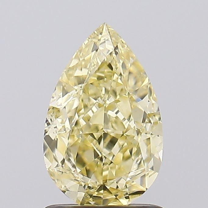 Loose Diamond - PEAR 1.4ct Fancy Yellow VVS2: Loose Diamond - PEAR 1.4ct Fancy Yellow VVS2 Source: This is a real non-mined Diamond that has been grown in a lab Shape: PEAR Carats: 1.4 Color: Fancy Yellow Certification: IGI Video:
