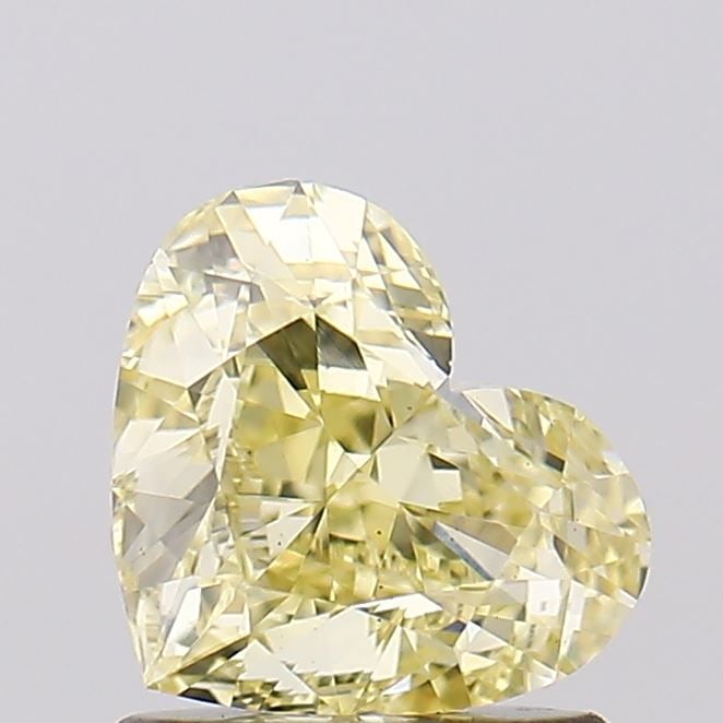 Loose Diamond - HEART 1.09ct Fancy Yellow VS1: Loose Diamond - HEART 1.09ct Fancy Yellow VS1 Source: This is a real non-mined Diamond that has been grown in a lab Shape: HEART Carats: 1.09 Color: Fancy Yellow Certification: IGI Video: