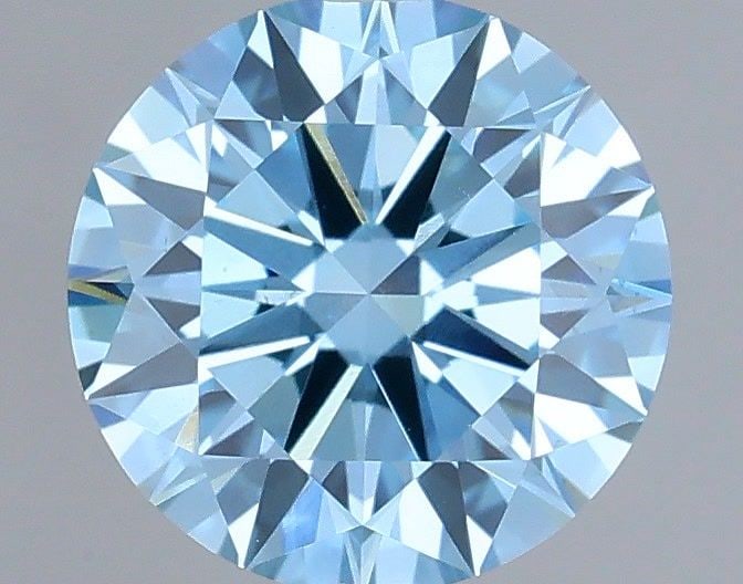 Ideal Loose Diamond - ROUND 0.7ct Fancy Vivid Blue VS1: Ideal Loose Diamond - ROUND 0.7ct Fancy Vivid Blue VS1 Source: This is a real non-mined Diamond that has been grown in a lab Shape: ROUND Carats: 0.7 Color: Fancy Vivid Blue Certification: IGI Video: