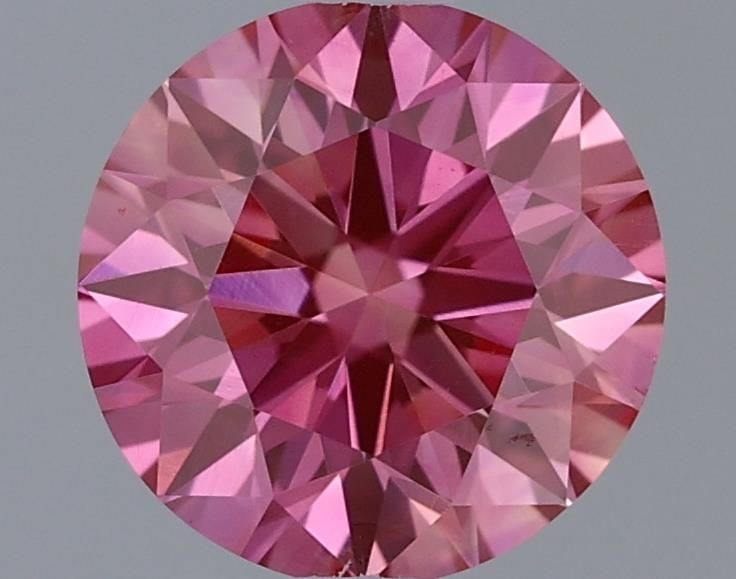 Ideal Loose Diamond - ROUND 0.54ct Fancy Vivid Pink VVS2: Ideal Loose Diamond - ROUND 0.54ct Fancy Vivid Pink VVS2 Source: This is a real non-mined Diamond that has been grown in a lab Shape: ROUND Carats: 0.54 Color: Fancy Vivid Pink Certification: IGI Vide