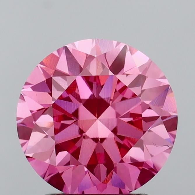 Loose Diamond - ROUND 2.01ct Fancy Vivid Pink VVS2: Loose Diamond - ROUND 2.01ct Fancy Vivid Pink VVS2 Source: This is a real non-mined Diamond that has been grown in a lab Shape: ROUND Carats: 2.01 Color: Fancy Vivid Pink Certification: IGI Video:
