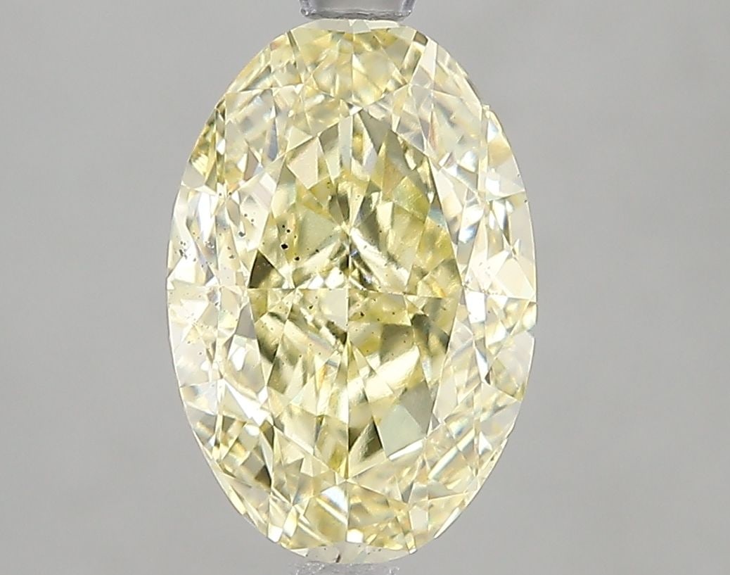 Loose Diamond - OVAL 3.01ct Fancy Intense Yellow SI1: Loose Diamond - OVAL 3.01ct Fancy Intense Yellow SI1 Source: This is a real non-mined Diamond that has been grown in a lab Shape: OVAL Carats: 3.01 Color: Fancy Intense Yellow Certification: IGI Video