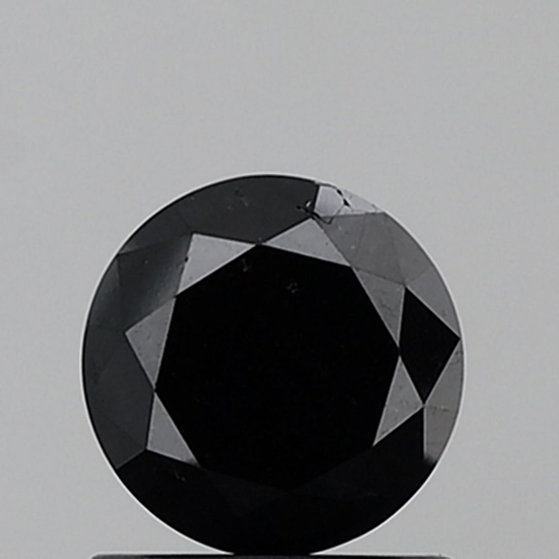 Loose Diamond - ROUND 1.1ct Fancy Black VS1: Loose Diamond - ROUND 1.1ct Fancy Black VS1 Source: Natural Shape: ROUND Carats: 1.1 Color: Fancy Black Certification: NONE Video: