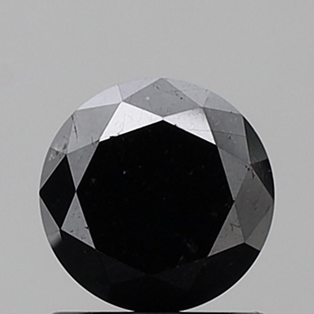 Loose Diamond - ROUND 1.28ct Fancy Black VVS2: Loose Diamond - ROUND 1.28ct Fancy Black VVS2 Source: Natural Shape: ROUND Carats: 1.28 Color: Fancy Black Certification: NONE Video: